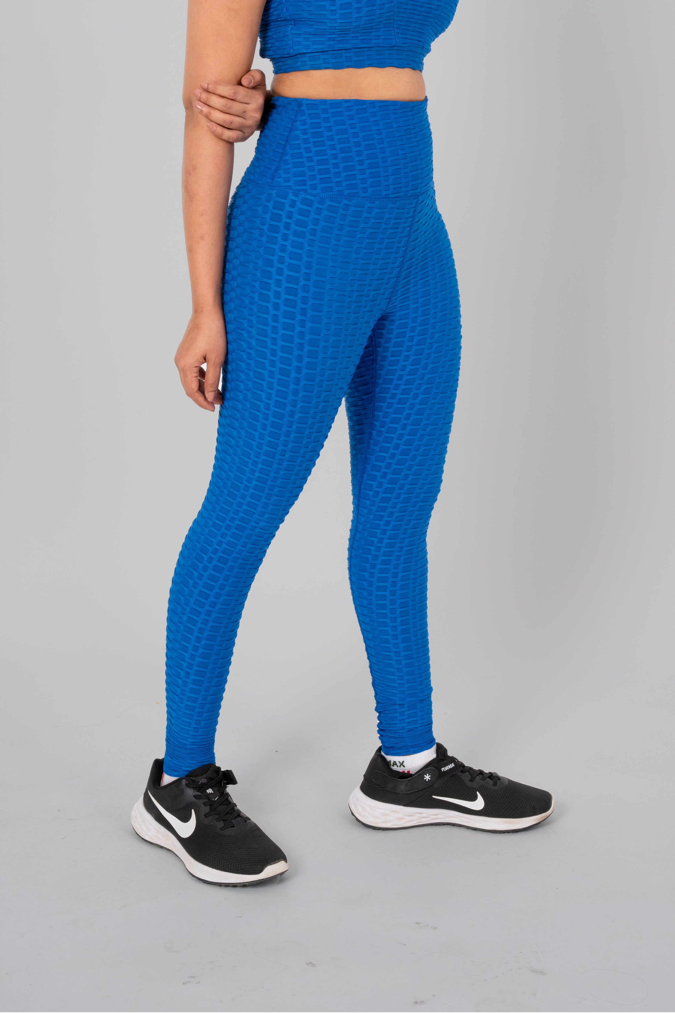 Woman in workout leggings, Teal Blue - side view standing, showing breathable fabric and anti-camel toe feature.@@@color_Teal-Blue