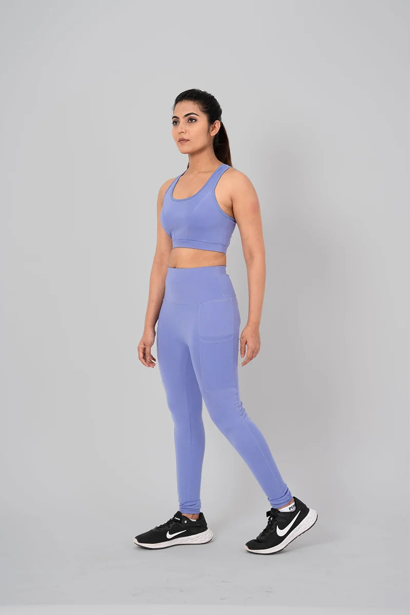 High-waist gym leggings in Lilac with side pockets and compression fabric