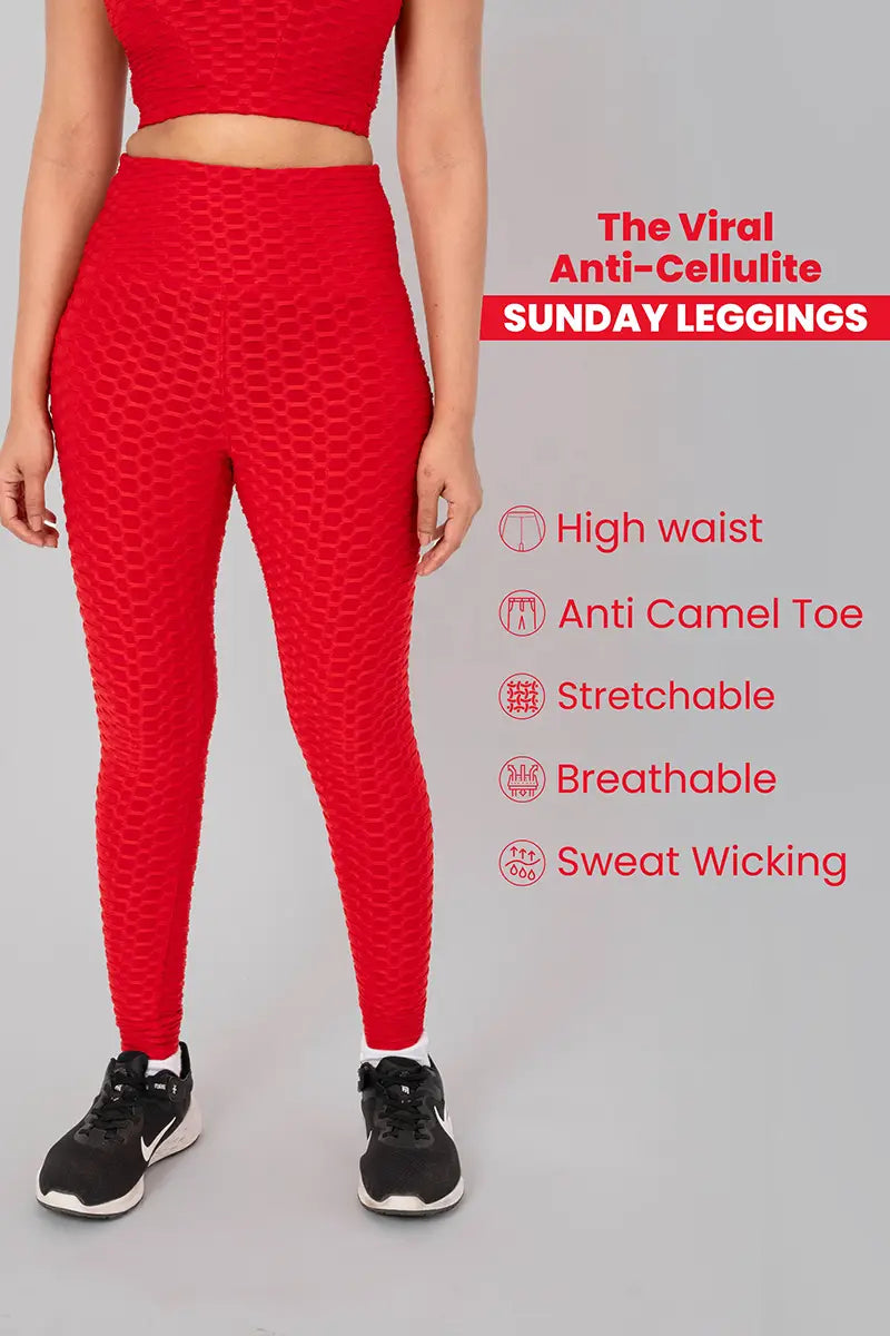 Woman in gym leggings, red - side view showing anti-camel toe design, breathable, and sweat-wicking properties.