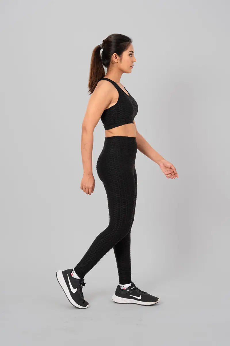 Women in gym wear, coord set - walking side view, featuring high-waisted fit and zero transparency guarantee.